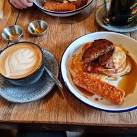 Pancakes with sausage, bacon, maple syrup and hashbrown bars. Plus an oat hazelnut latte at Mighty Wieners  in Bournemouth