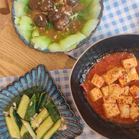 Braised mushrooms, cucumber salad, mala tofu at Bilig Vegan Bistro in Ulaanbaatar