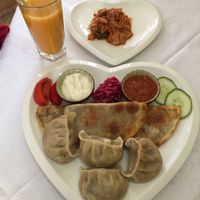 Monoglian Combo, Seabuckthorn Juice, and Kimchi at Bilig Vegan Bistro in Ulaanbaatar