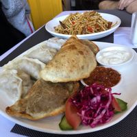 Traditional plate and noodles at Bilig Vegan Bistro in Ulaanbaatar