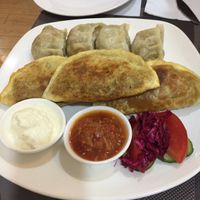 Different dumplings with vegan meat filling and two dips at Bilig Vegan Bistro in Ulaanbaatar