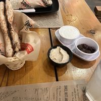 Meal with the bread and dips they serve (even if you don’t ask)   at Souvlaki in Mykonos