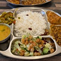 A selection of delicious vegan curries, salad, rice and a dal soup. The bean curry was wonderful.  at Aahaar Indian Cuisine in Antwerpen