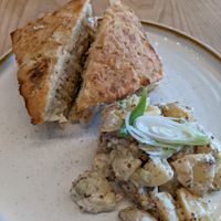Tempeh Reuben and side of Potato Salad at Kind Cafe in Vancouver