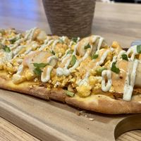 Buffalo cauliflower flatbread  at Kind Cafe in Vancouver