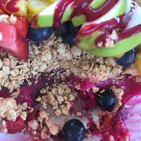 My Banzai Bowl 1/2 eaten so you can see the layers of sorbet, granola, and fruit. So good! at Al's Aloha Kitchen in Hilton Head Island