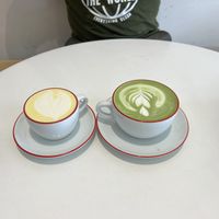 Green matcha latte is old cup size (special order). Golden Milk is the new reduced size, 8oz. Smaller size, same price    at Project Coffee - Burns Court in Sarasota