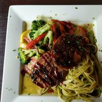 Raspberry pistachio ";chicken"; w/ veggies and pesto pasta at Marco Polo Global Restaurant in Salem