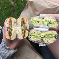 Sundried tomato pesto with pickles and hummus, and an avocado bagel! at Beam Me Up Bagels in Dunedin