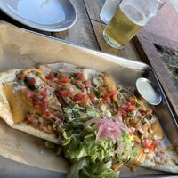 Quesadilla with crema on the side. Beer.   at Craft Roots  in Morgan Hill