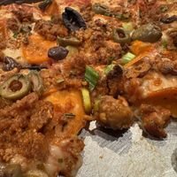 Animal Lover pizza with olives oil  at Craft Roots  in Morgan Hill