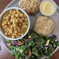Maya Angelou plate. Best kale salad of all time. With curry chickpea and crab cakes  at SweetArt in St Louis