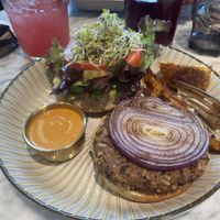bestest BURGER w watermelon agua fresca & hibiscus juicee  at Lamara Coffee and Kitchen in New Orleans