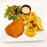 PLANT BASED SCHNITZEL WITH MAJO AND FRESH POTATOES at Let's Vegan in Crete