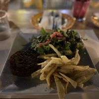 Lentil burger with chips & salad  at Let's Vegan in Crete