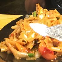 Drunken noodles with tofu bell peppers and carrots at Udom Thai in Centennial
