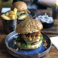 Beyond meat burger and triple cooked chips (ignore the slaw, that wasn’t part of my order).  at A Nation of Shopkeepers in Leeds
