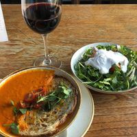 “Roasted red pepper, tomato and basil soup” and “Nutbourne tomato, red onion & rocket salad, coconut dressing”. at Bull & Gate in North West London