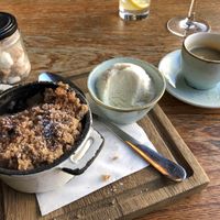 “Peach and Bradley apple crumble with vegan vanilla ice cream” at Bull & Gate in North West London