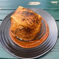 Crispy bread covering the chilli  at Off The Rails in Yarmouth