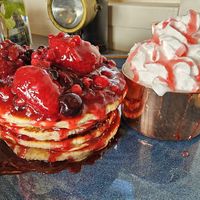 Vegan pancakes with mixed berries, plum sauce and cream at Off The Rails in Yarmouth