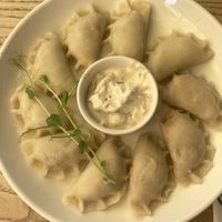 Dumplings with soy meat, pickles, mayonnaise etcc  at Pierogarnia Mandu Centrum in Gdansk