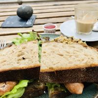 Vegan sausage sandwich with grains and salad...delicious 🌟🌟🌟🌟🌟 at The Hideaway in Seaton