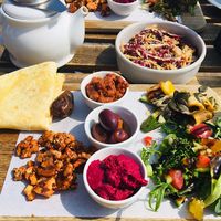 Amazing vegan mezze very tasty, sitting in the sunshine by the sea 🌞 Service excellent  at The Hideaway in Seaton