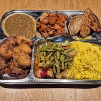 A loaded tray of food at Dhaba Beas - Lucerna in Prague