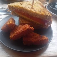 Pesto Breakfast Sandwich and 3 Hash browns at PEACH in Newport