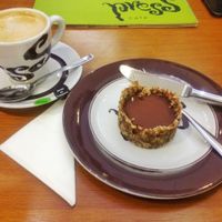 Coffee with coconut milk, and a vegan gluten-free chocolate pie. at Press Cafe in Porto Alegre