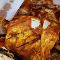 Wet burrito and spicy fyi. Not convenient on the plane. at LAX - Barney's Beanery - T2 in Los Angeles