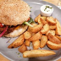 Burger and potatoes at Kind Kitchen in Porto