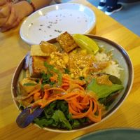 Bowl with peanut sauce at Kind Kitchen in Porto