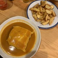 Francesinha with wedges at Kind Kitchen in Porto