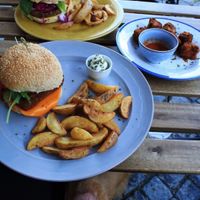 Beyond burger, tofu nuggets and Seitan schnitzel burger🍔 Dogs are welcome both inside and outside!  at Kind Kitchen in Porto