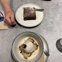 peanut butter and chocolate brownie, berry crumble with ice cream  at Kind Kitchen in Porto