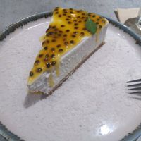 Cheesecake with passion fruit at Kind Kitchen in Porto