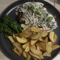 seitan steak with mushrooms  at Kind Kitchen in Porto