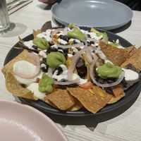 Loaded nachos   at Kind Kitchen in Porto