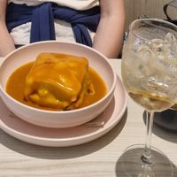 Francesinha with fries at Kind Kitchen in Porto