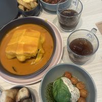 Francesinha on the left, nuggets at the top, burata at the bottom   at Kind Kitchen in Porto