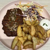 Chimichurri seitan steak with coleslaw and steak   at Kind Kitchen in Porto