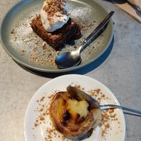 Caramel peanut butter brownie with ice cream & pastel de nata. at Kind Kitchen in Porto