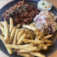 Chimichurri ‘steak’ with chips and coleslaw   at Kind Kitchen in Porto