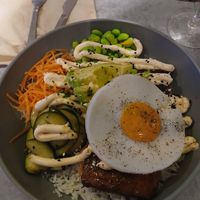 Salmon bowl with added extra egg at Kind Kitchen in Porto