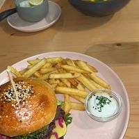 Bean burger for me. Curry bowl for him - both delicious 😋   at Kind Kitchen in Porto