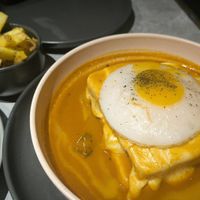 Francesinha con huevo at Kind Kitchen in Porto