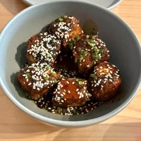 Tofu bites as starter, great sauce, crispy outside and quiet big!  at Kind Kitchen in Porto