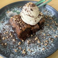Peanut brownie with ice creamm  at Kind Kitchen in Porto
